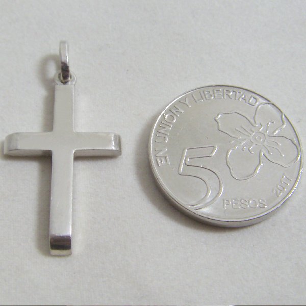 (p1135)Cruz de plata maciza con puntas bombe.